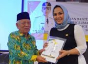 Bupati Cellica Serahkan Bantuan Rutisae