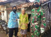 Dandim Brebes Bagikan Paket Sembako kepada Warga terdampak Banjir Rob.