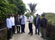PT TPL Bangun  akses Jalan Rabat Beton kelahan pertanian di Desa Lumban Huala