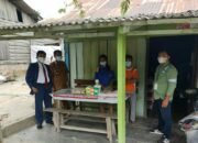 Penyerahan bantuan oleh PT.TPL pada masyarakat terpapar Covid 19 di 2 desa kecamatan Parmaksian.