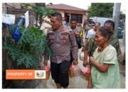 IPTU Irvan Robert Sitompul SH,MH Kapolsek Pagar Merbau Peduli Pada Warga Terkena Banjir Di Desa Bandar Dolok Deli Serdang